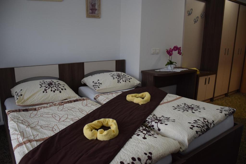 Postel nebo postele na pokoji v ubytování Hostel Novak