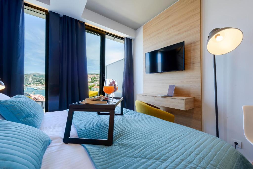 TV a/nebo společenská místnost v ubytování Adriatic Deluxe Apartments