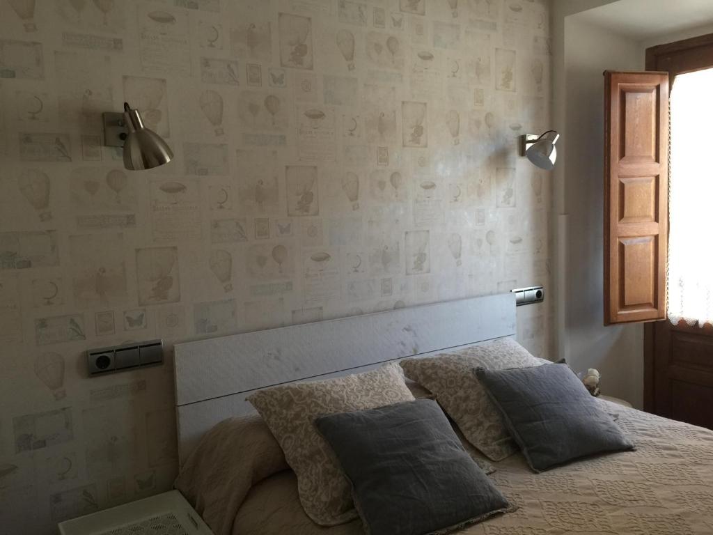 Posteľ alebo postele v izbe v ubytovaní Hostal El Resbalon
