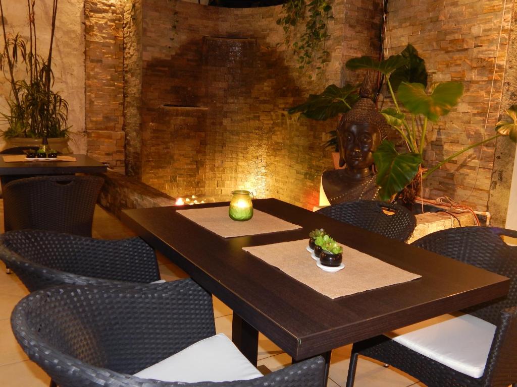 Posezení v ubytování Allamanda Hotel