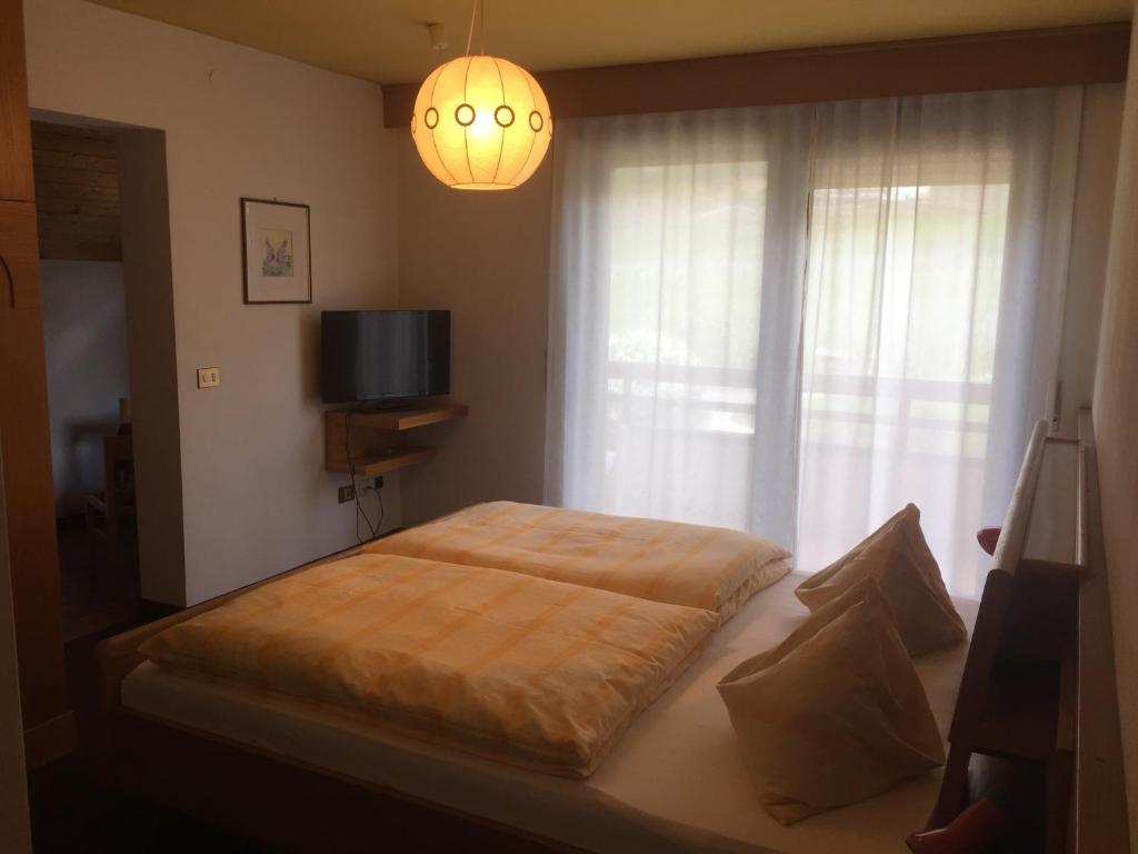 Postel nebo postele na pokoji v ubytování Residence Gerold