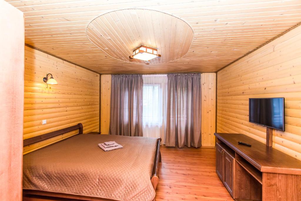 Postel nebo postele na pokoji v ubytování Cottage Berdo