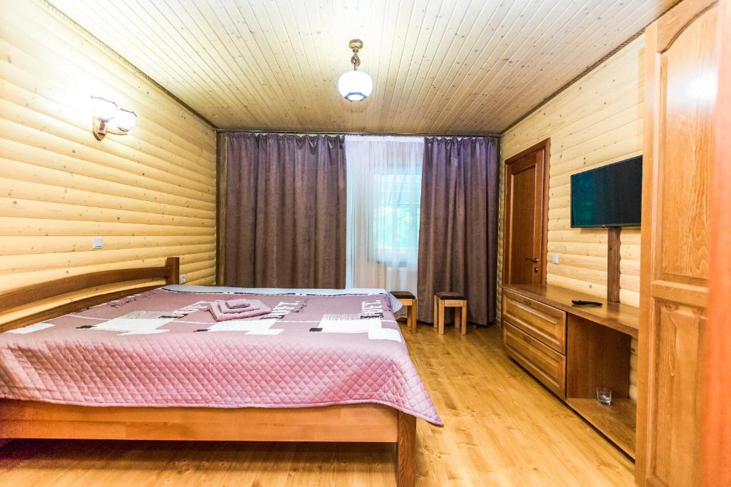 Postel nebo postele na pokoji v ubytování Cottage Berdo
