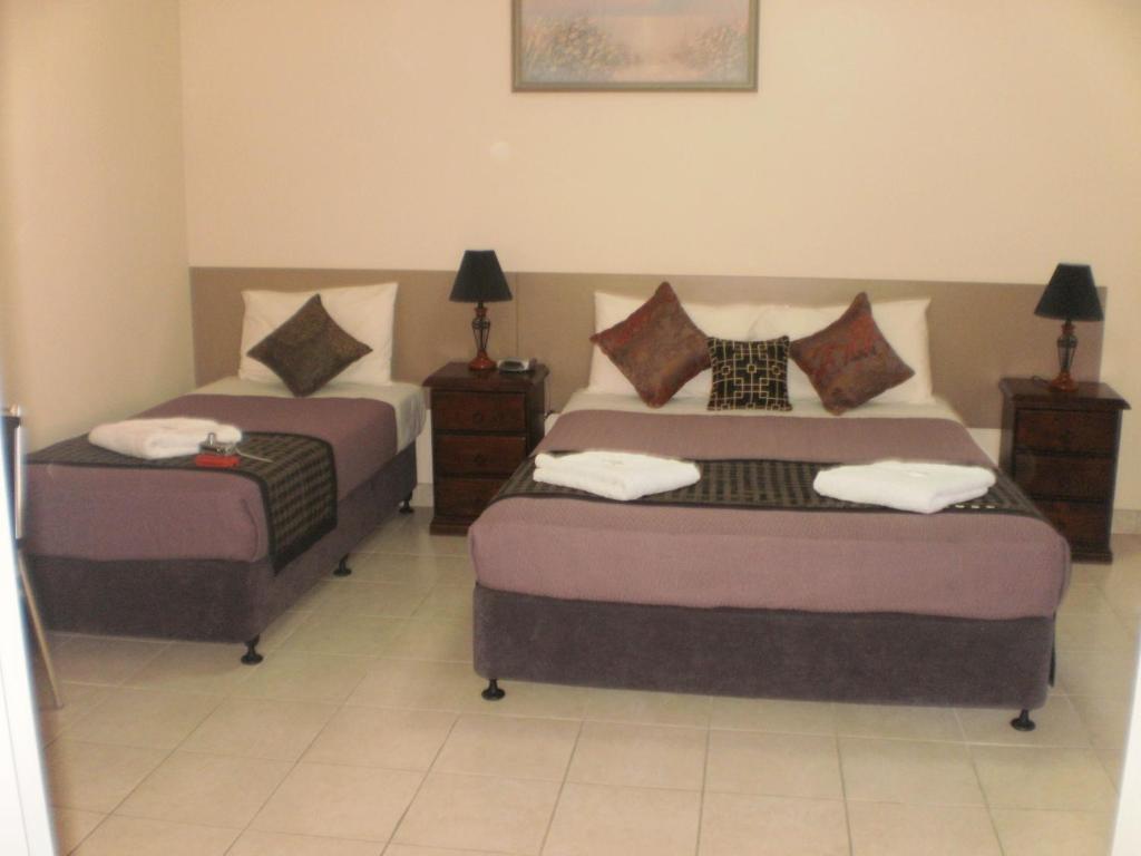 Ένα ή περισσότερα κρεβάτια σε δωμάτιο στο Molika Springs Motel