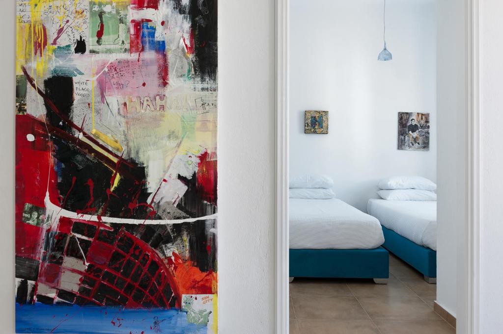 Postel nebo postele na pokoji v ubytování Christou Estate & Villas