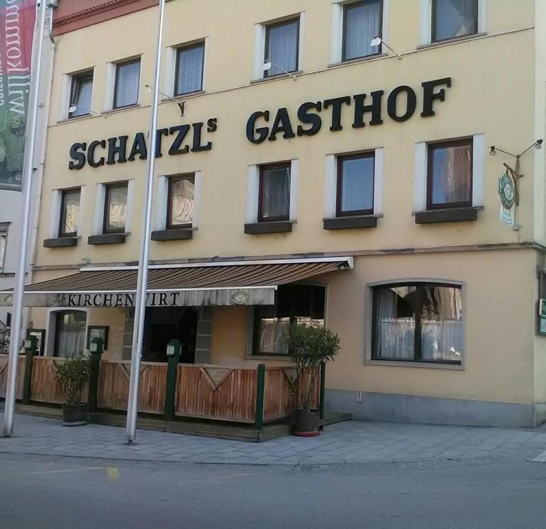 a building with a sign that reads schlitzka cafeteria at Gasthof Schatzl in Grieskirchen