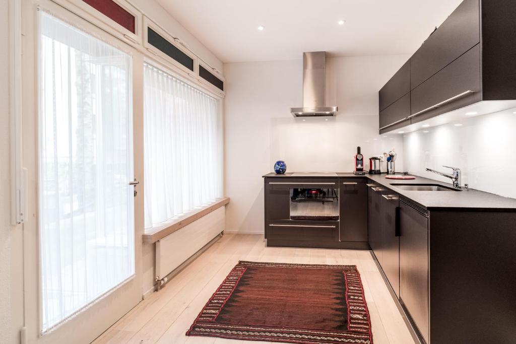Kuchyň nebo kuchyňský kout v ubytování Appartements Hofquartier