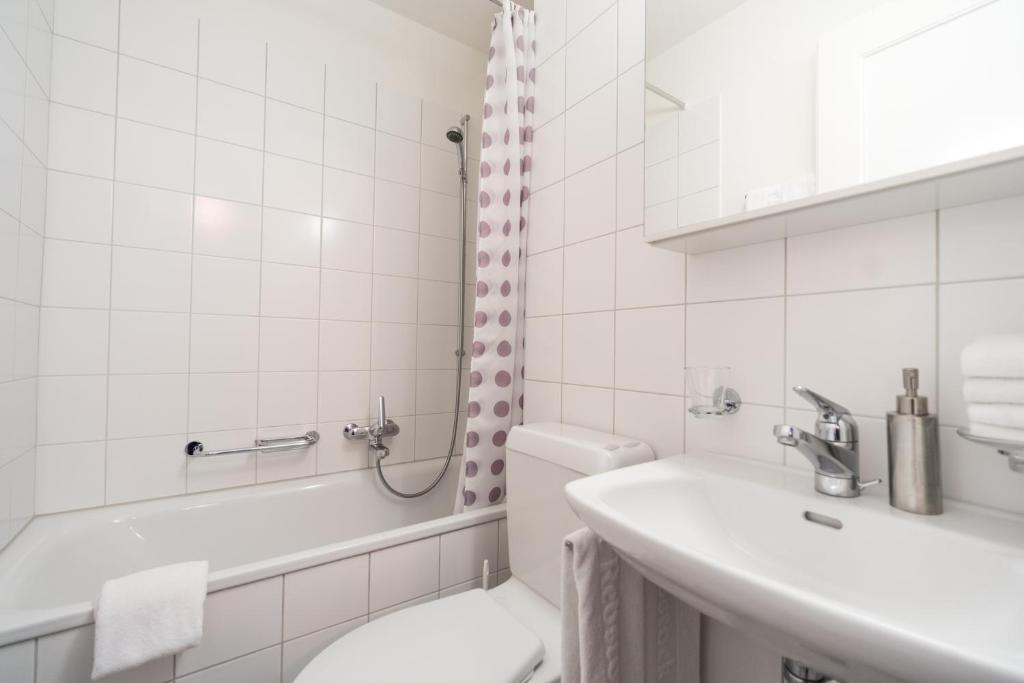 Koupelna v ubytování Appartements Hofquartier