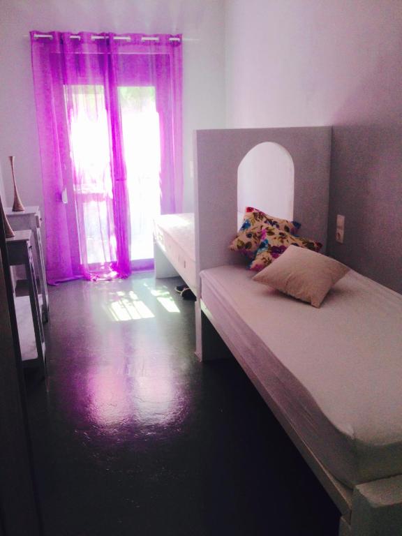 Postel nebo postele na pokoji v ubytování Heraklion Gortyn Phaistos House