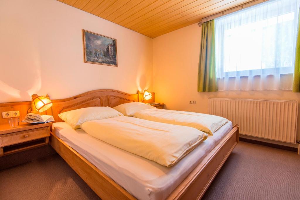 Postel nebo postele na pokoji v ubytování Appartementhaus Jägerheim
