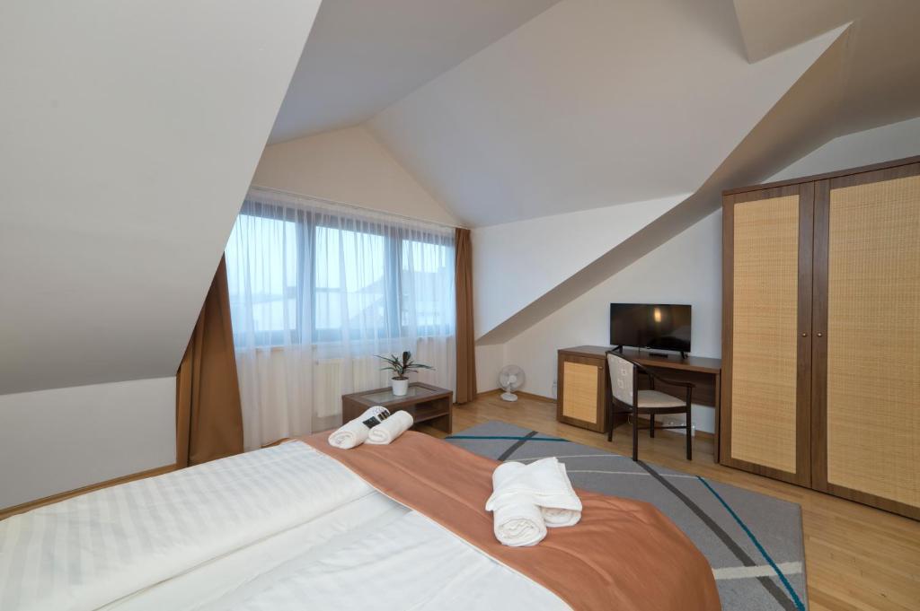 Krevet ili kreveti u jedinici u okviru objekta Hotel Art