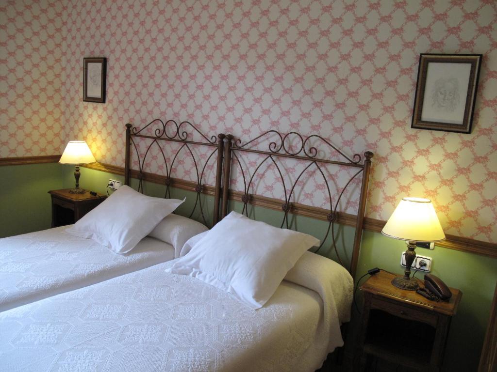 Postel nebo postele na pokoji v ubytování Hotel Casa Anita