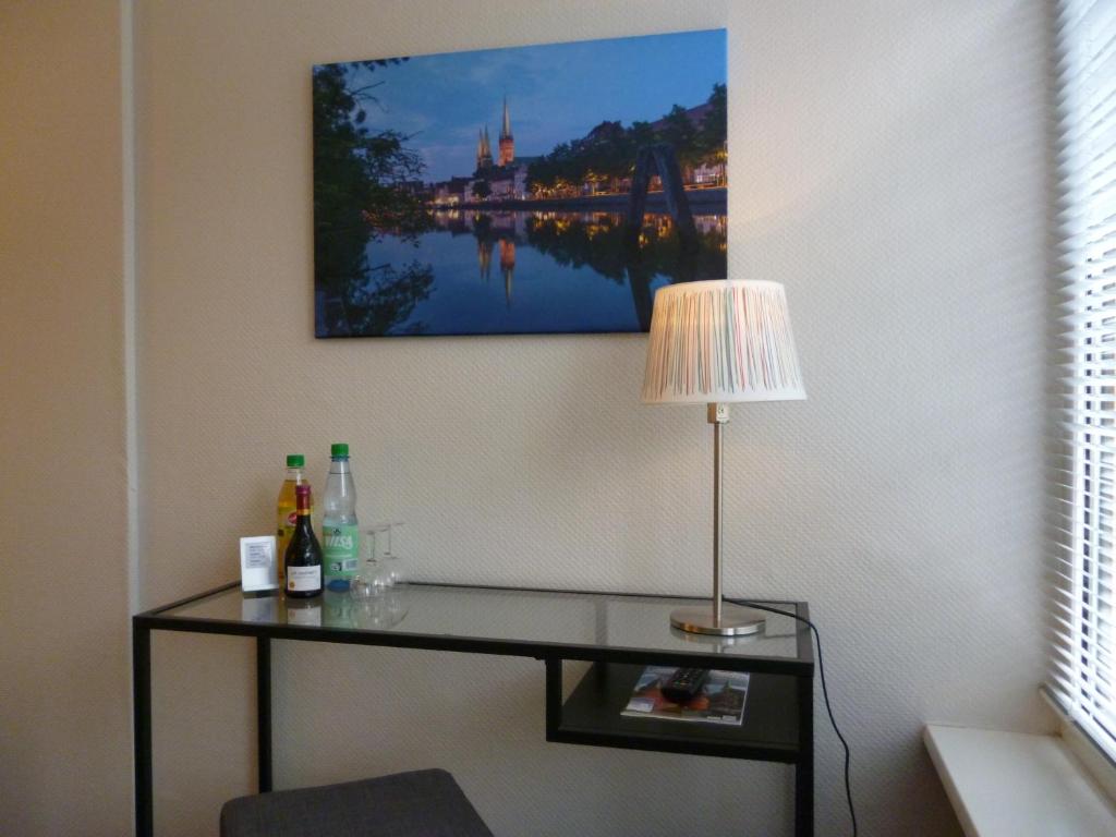 TV a/nebo společenská místnost v ubytování Hotel Am Mühlenteich