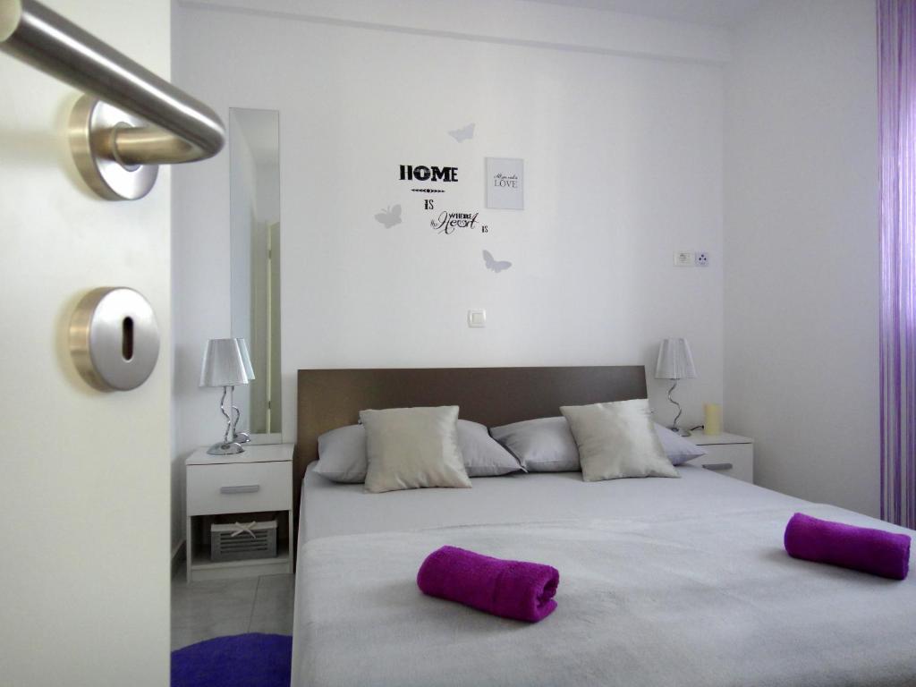 Posteľ alebo postele v izbe v ubytovaní Apartments Blu Mare