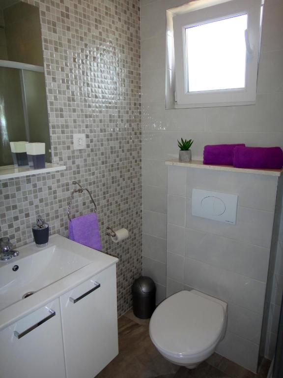 Kúpeľňa v ubytovaní Apartments Blu Mare