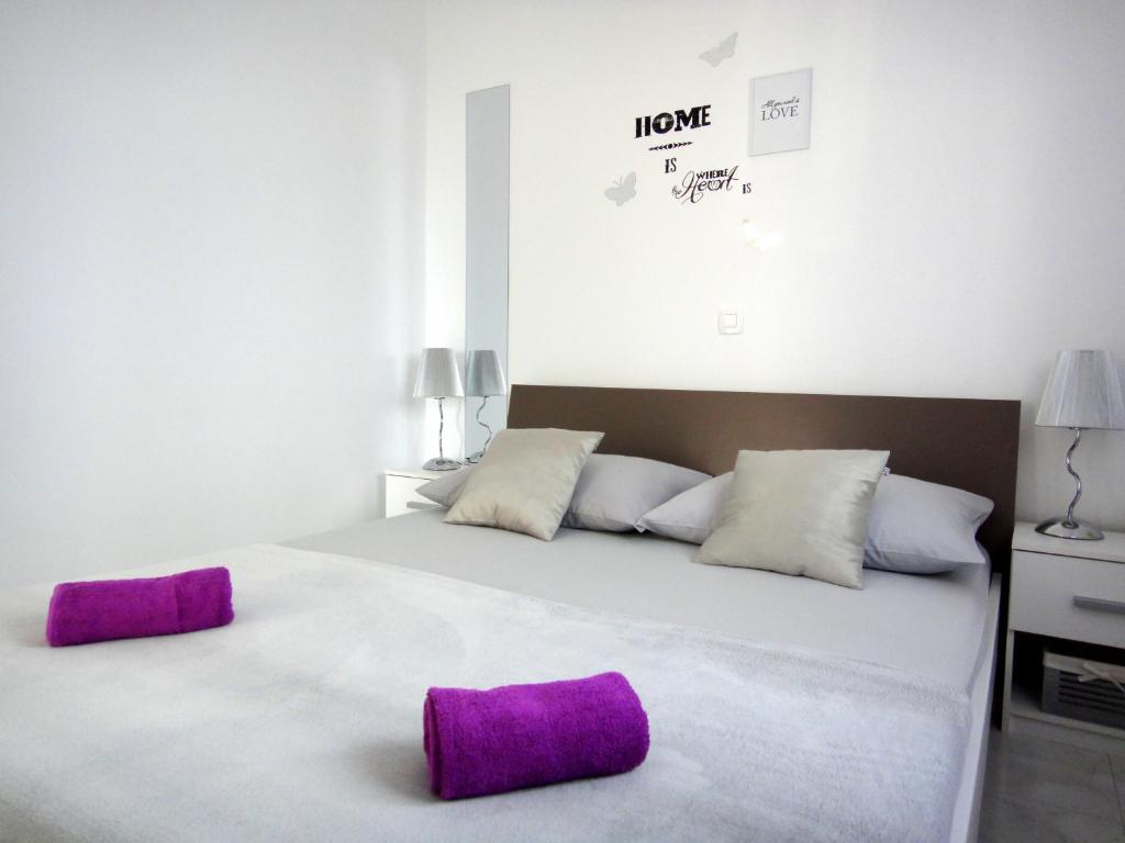 Posteľ alebo postele v izbe v ubytovaní Apartments Blu Mare