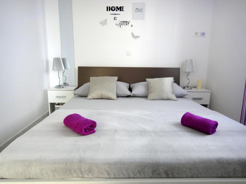 Posteľ alebo postele v izbe v ubytovaní Apartments Blu Mare