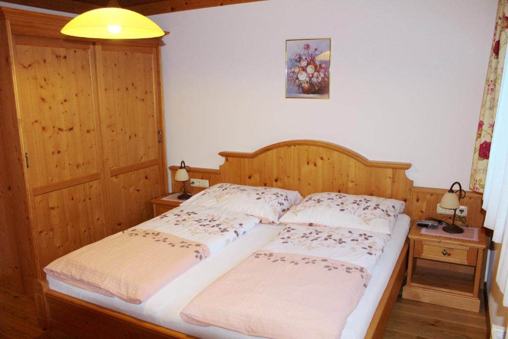 Postel nebo postele na pokoji v ubytování Gästehaus Toferer