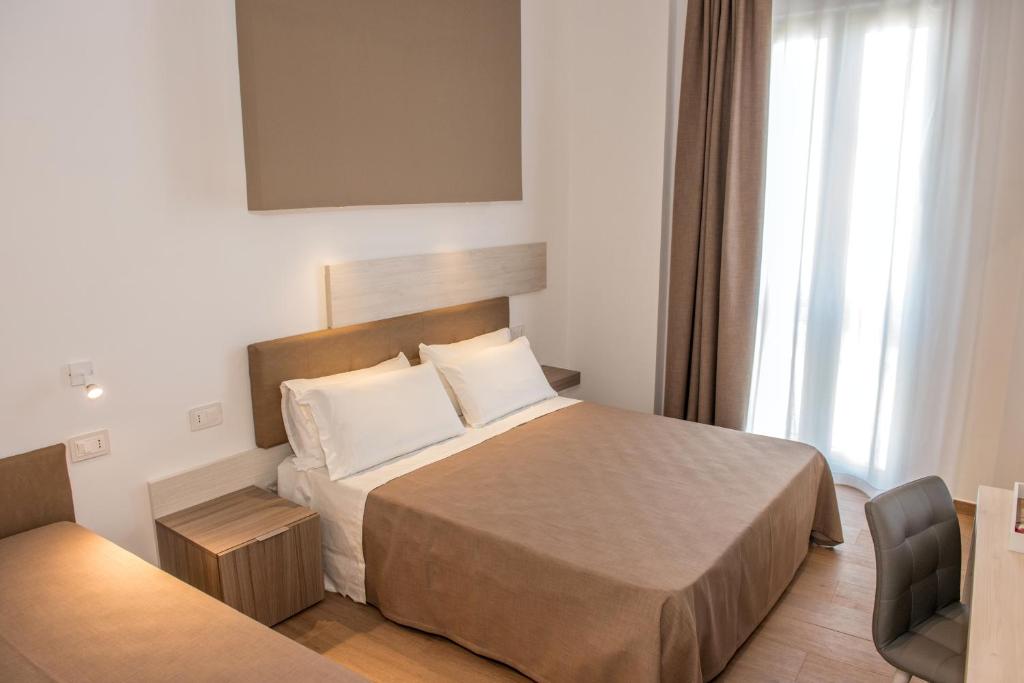 Posteľ alebo postele v izbe v ubytovaní I Cordari B&B