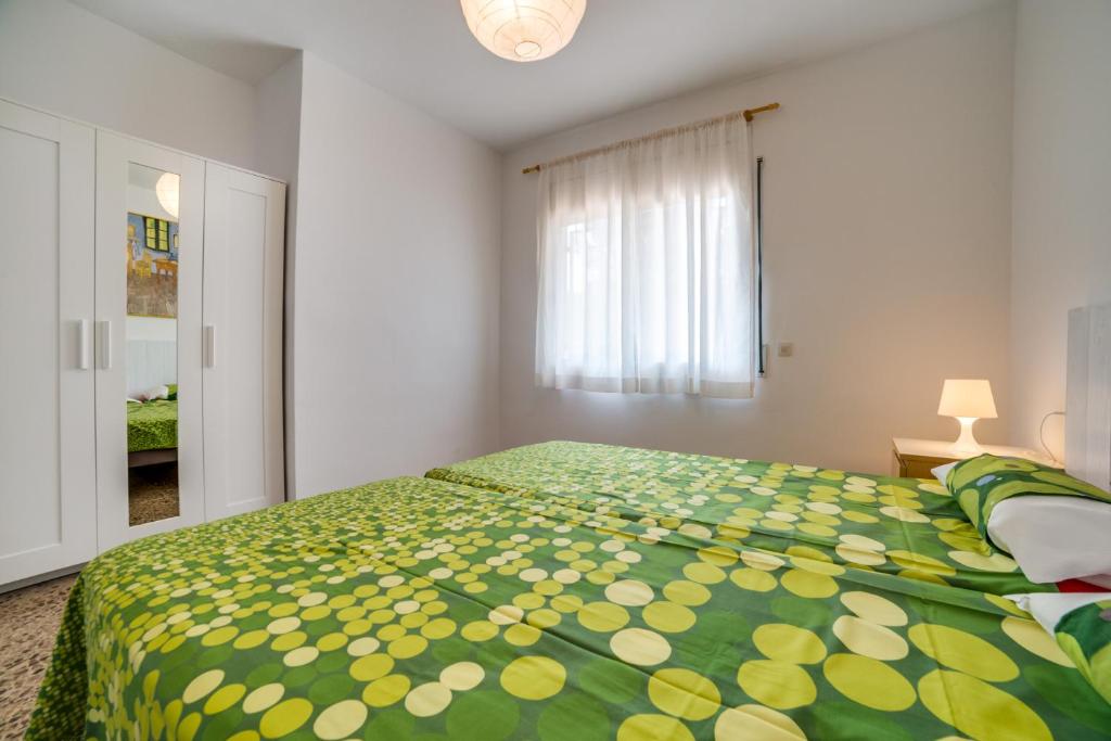Postel nebo postele na pokoji v ubytování Vivalidays Casa Genis