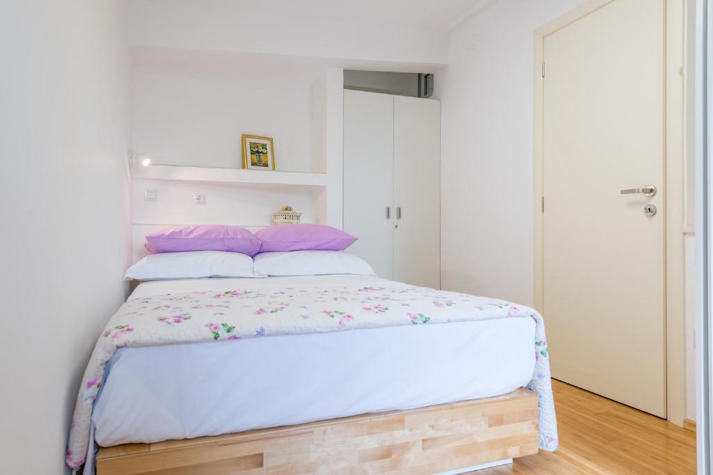 Posteľ alebo postele v izbe v ubytovaní Apartment Ortensia Dubrovnik Colors
