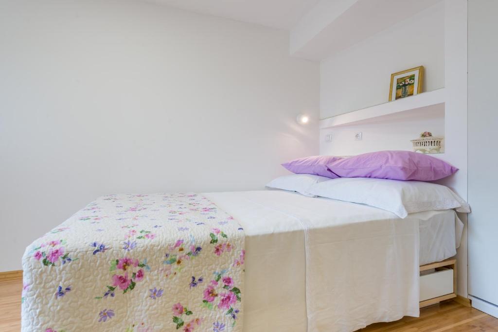 Posteľ alebo postele v izbe v ubytovaní Apartment Ortensia Dubrovnik Colors