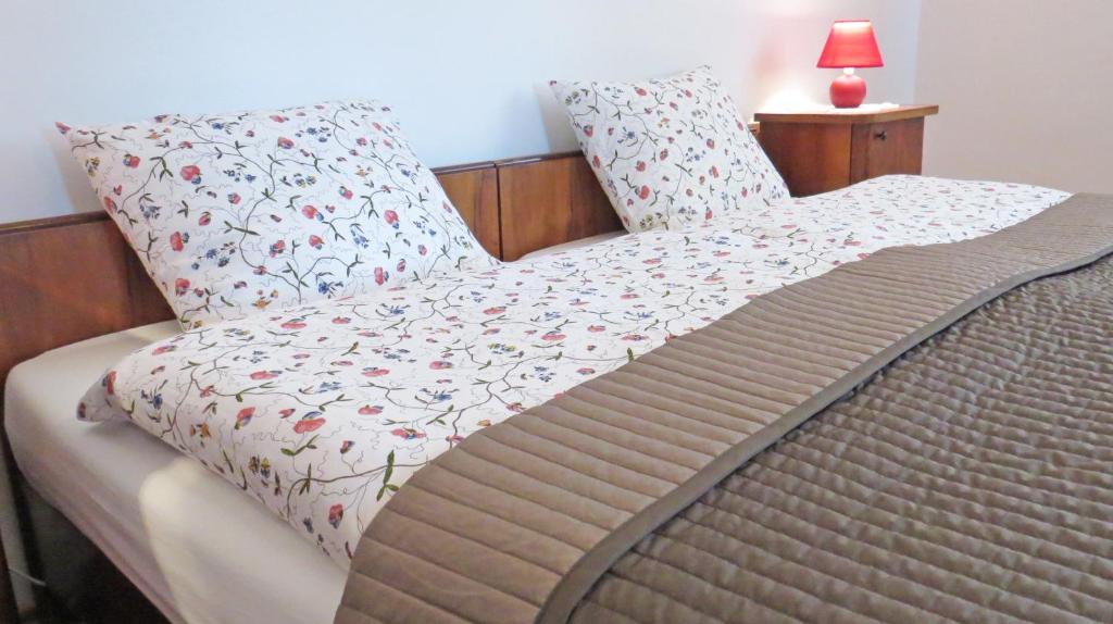 Postel nebo postele na pokoji v ubytování Tarjányi Vendégház