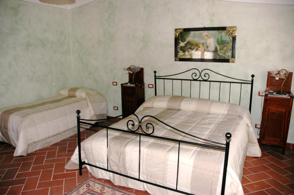 Posteľ alebo postele v izbe v ubytovaní Piccolo Hotel San Valentino