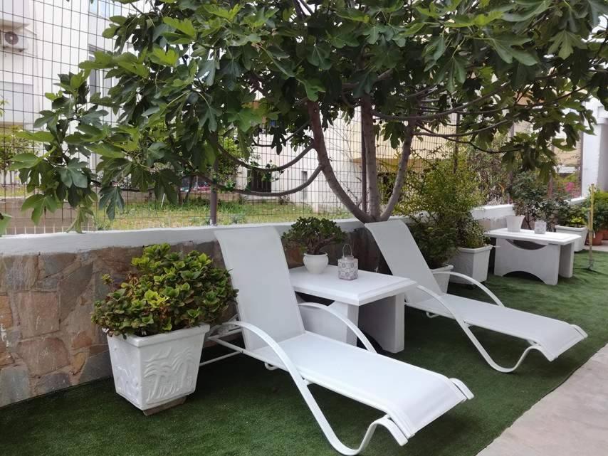A garden outside Maria's Apartments