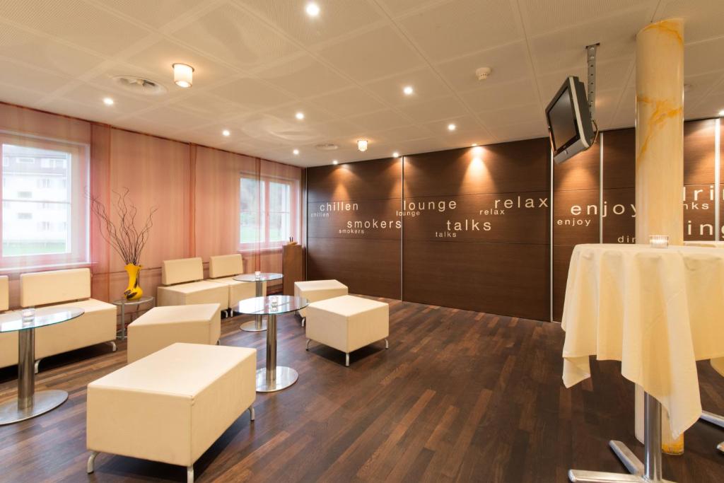 Uma área de estar em Hotel Thorenberg