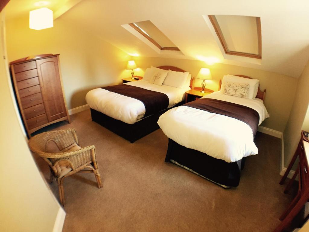 Postel nebo postele na pokoji v ubytování Beach Haven B&B