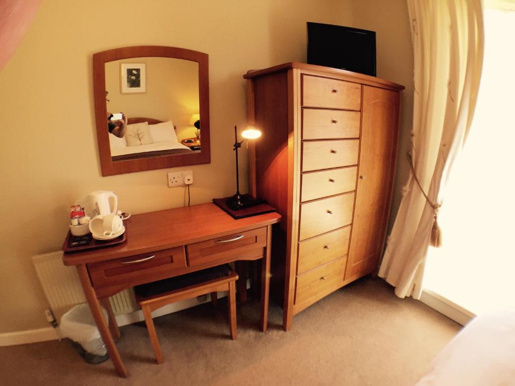 TV a/nebo společenská místnost v ubytování Beach Haven B&B