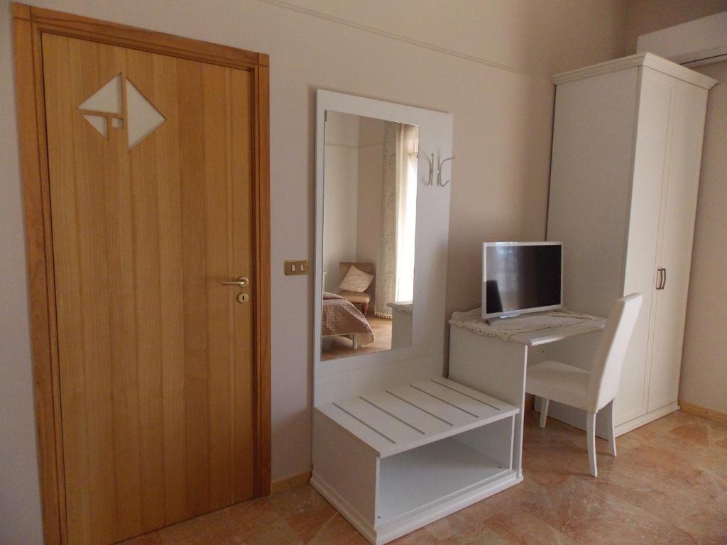 Telewizja i/lub zestaw kina domowego w obiekcie B&B Soli D'oro