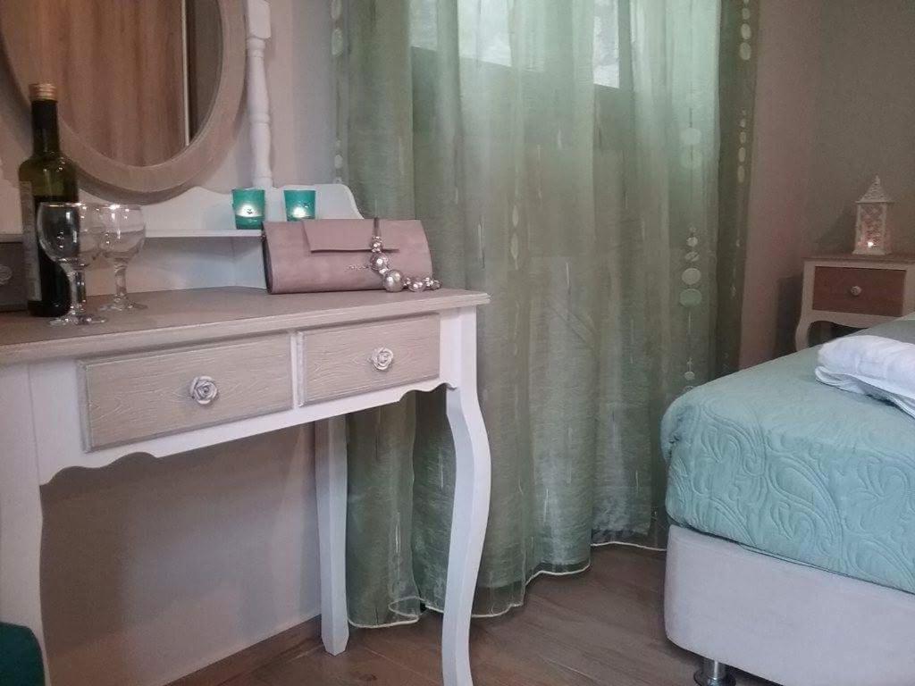 A bed or beds in a room at Villa Lobos (Labrini)
