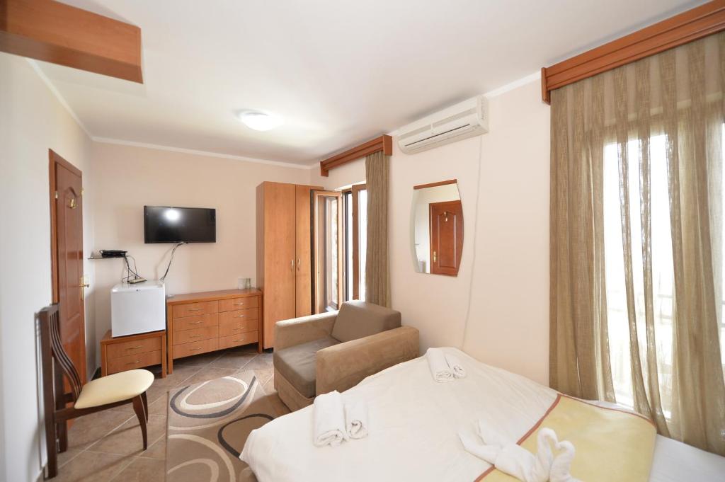 TV a/nebo společenská místnost v ubytování Hotel Anderba