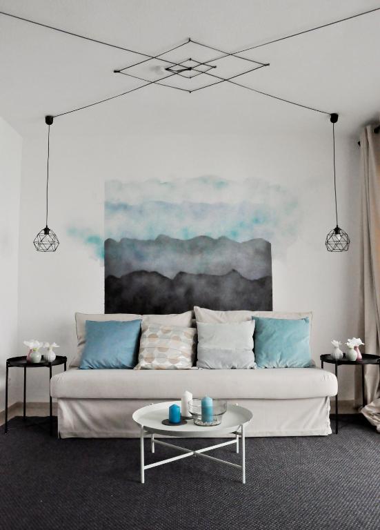 A seating area at Apartment Albufereta beach