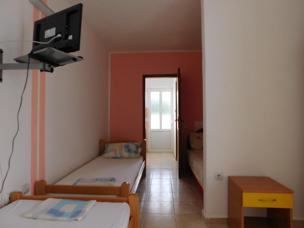Postel nebo postele na pokoji v ubytování Vila Rada
