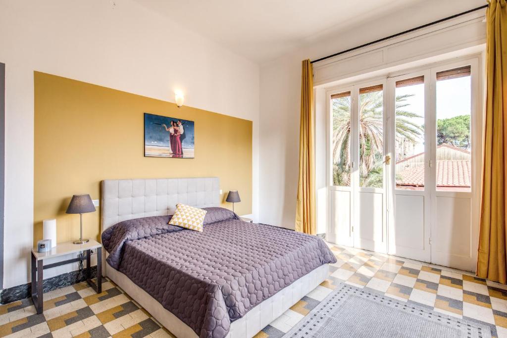 Postel nebo postele na pokoji v ubytování AwesHomeItaly - Cinque Terre Sea Sensations