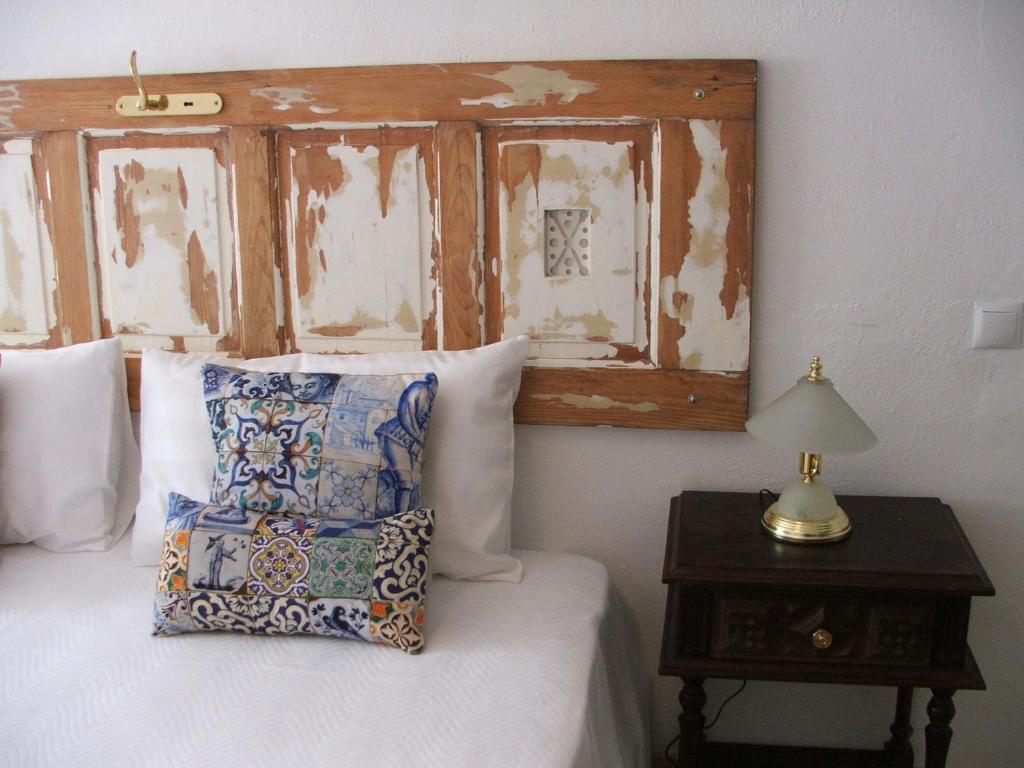 En eller flere senge i et værelse på Casa dos Pedro´s