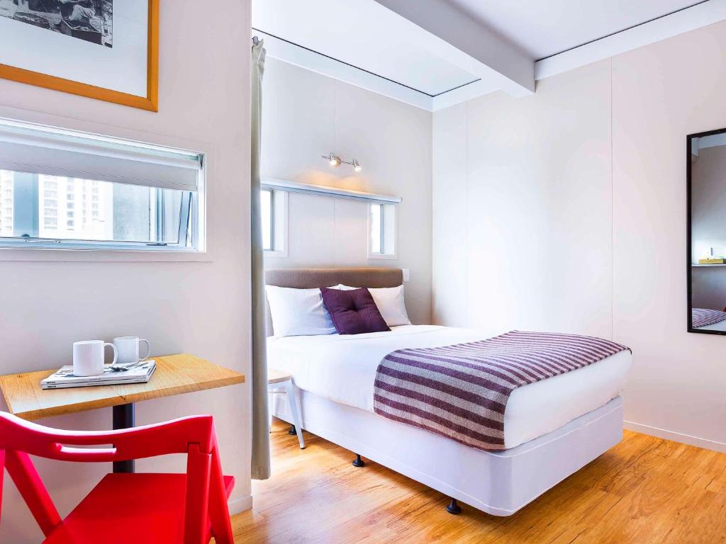 Postel nebo postele na pokoji v ubytování ibis budget Auckland Central