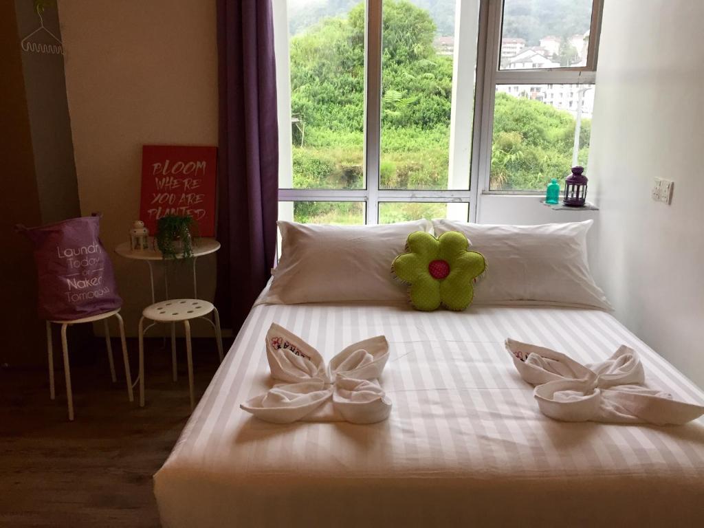 Postel nebo postele na pokoji v ubytování Hotel Flora Plus