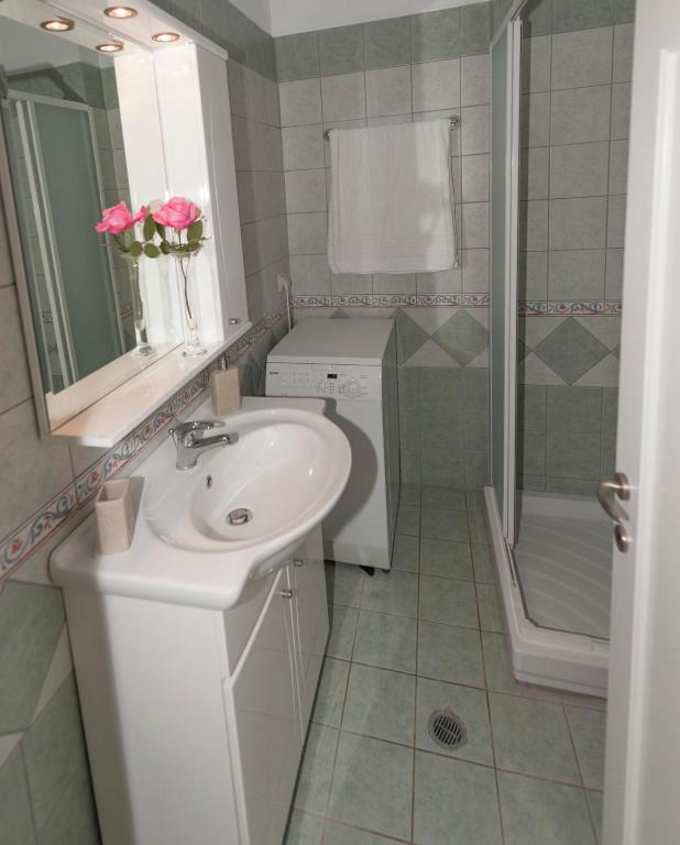 Kúpeľňa v ubytovaní Barbati Pietre Di Mare
