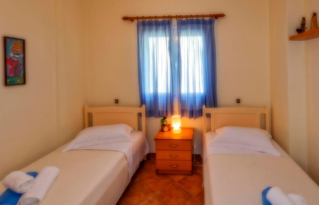Posteľ alebo postele v izbe v ubytovaní Barbati Pietre Di Mare
