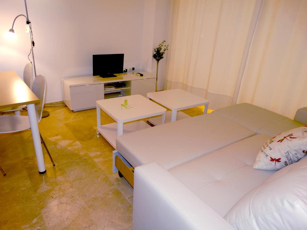 TV a/nebo společenská místnost v ubytování Minimalist Loft Center by gms apartamentos