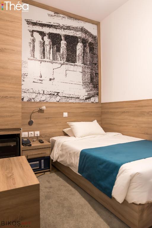 Łóżko lub łóżka w pokoju w obiekcie Marianna Hotel