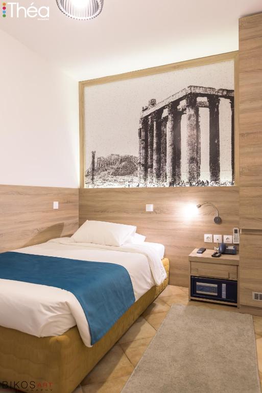 Łóżko lub łóżka w pokoju w obiekcie Marianna Hotel