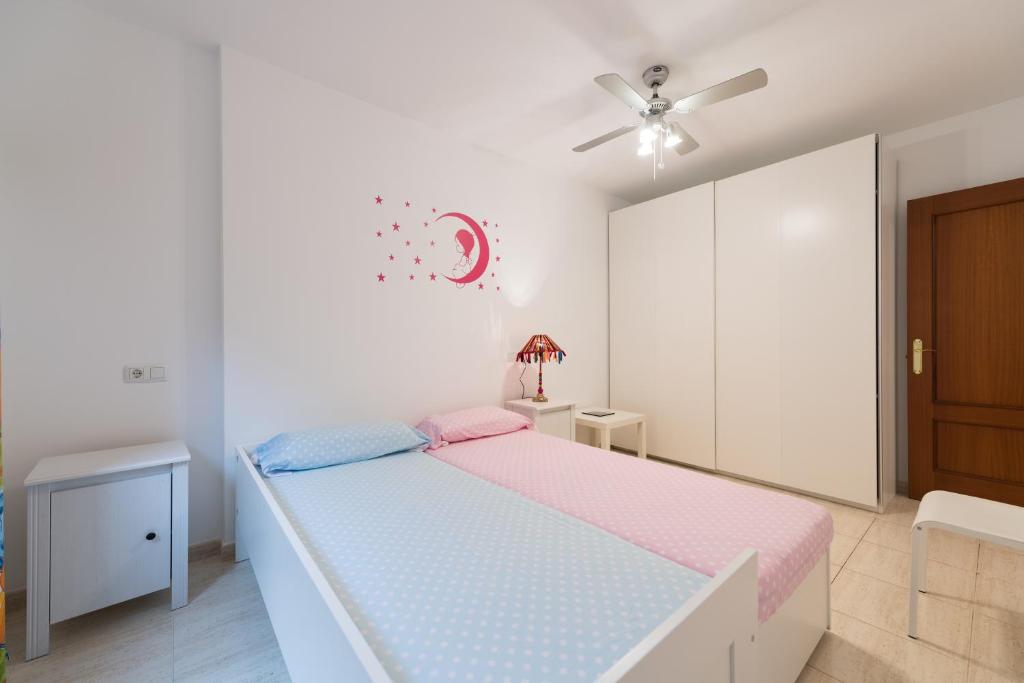 Postel nebo postele na pokoji v ubytování Casa Angel A3