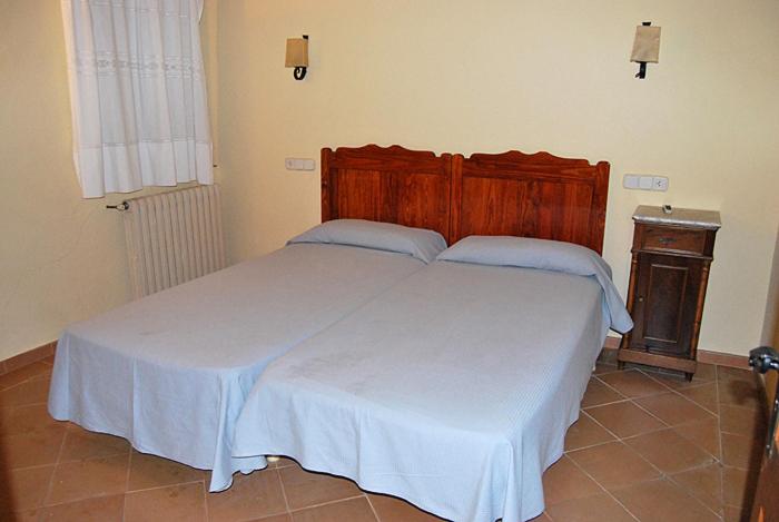 Postel nebo postele na pokoji v ubytování Mas la Torre