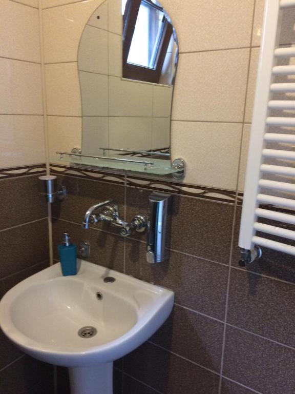 Koupelna v ubytování Guesthouse Gia