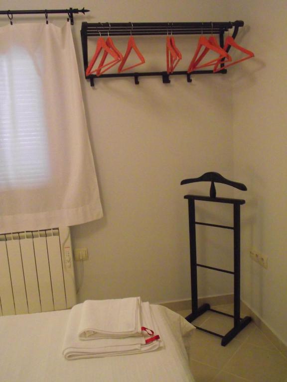 Postel nebo postele na pokoji v ubytování Apartamentos Puenteviejo
